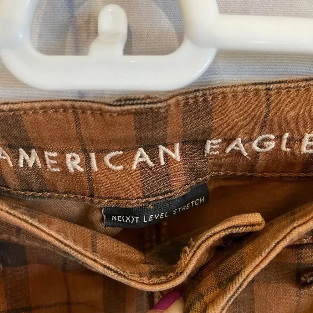 American Eagle size 4 next level check plaid rust color pants hi rise Jeggings